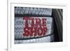 USA, Nevada. Beatty, tire shop sign painted on old tires-Kevin Oke-Framed Premium Photographic Print