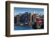 USA, New Hampshire, Portsmouth, waterfront buildings with tugboat-Walter Bibikow-Framed Photographic Print