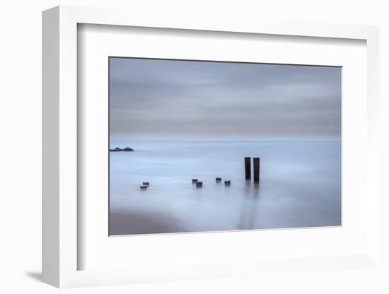 USA, New Jersey, Cape May National Seashore. Beach pilings on stormy sunrise.-Jaynes Gallery-Framed Photographic Print