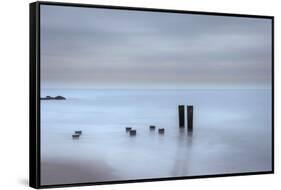 USA, New Jersey, Cape May National Seashore. Beach pilings on stormy sunrise.-Jaynes Gallery-Framed Stretched Canvas