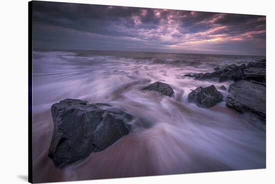 USA, New Jersey, Cape May National Seashore. Sunrise on rocky shore and ocean.-Jaynes Gallery-Stretched Canvas