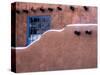 USA, New Mexico, Sant Fe, Adobe structure with protruding vigas and Snow-Terry Eggers-Stretched Canvas