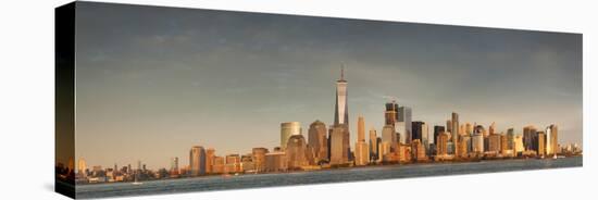 USA, New York City, Lower Manhattan skyline with Freedom Tower from New Jersey-Walter Bibikow-Stretched Canvas