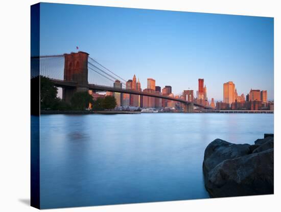 USA, New York, Manhattan, Downtown Financial District and Brooklyn Bridge-Alan Copson-Stretched Canvas