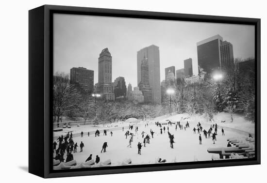 USA, New York, New York City, Skaters at the Wollman Rink-Walter Bibikow-Framed Stretched Canvas