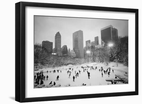 USA, New York, New York City, Skaters at the Wollman Rink-Walter Bibikow-Framed Photographic Print