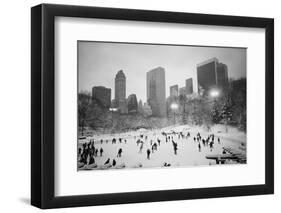 USA, New York, New York City, Skaters at the Wollman Rink-Walter Bibikow-Framed Photographic Print