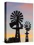 USA, Oklahoma, Elk City, Vintage Farm Windmills-Walter Bibikow-Stretched Canvas