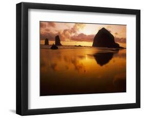 USA, Oregon, Cannon Beach Haystack Rock silhouetted at sunset.-Stuart Westmorland-Framed Photographic Print