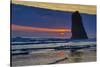 USA, Oregon, Cannon Beach. Sunset on Lone Seastack-Jean Carter-Stretched Canvas