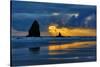 USA, Oregon, Cannon Beach. Sunset on Needles Seastack-Jean Carter-Stretched Canvas