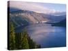 USA, Oregon, Crater Lake National Park. Morning clouds hover over west rim of Crater Lake.-John Barger-Stretched Canvas