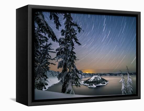 USA, Oregon, Crater Lake National Park. Star trails over Crater Lake and Wizard Island in winter.-Yuri Choufour-Framed Stretched Canvas