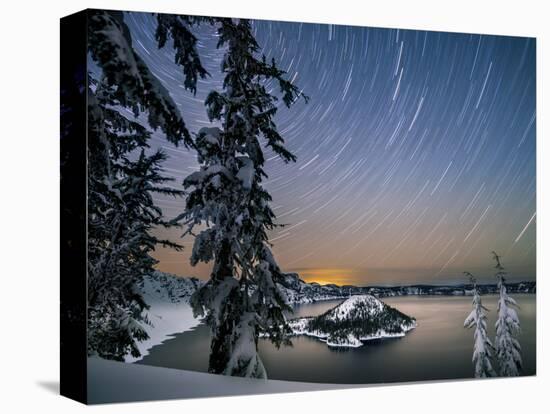 USA, Oregon, Crater Lake National Park. Star trails over Crater Lake and Wizard Island in winter.-Yuri Choufour-Stretched Canvas