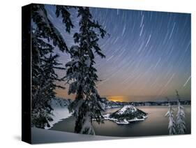 USA, Oregon, Crater Lake National Park. Star trails over Crater Lake and Wizard Island in winter.-Yuri Choufour-Stretched Canvas