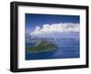 USA, Oregon. Crater Lake National Park, thunder clouds float over Wizard Island and Crater Lake.-John Barger-Framed Photographic Print