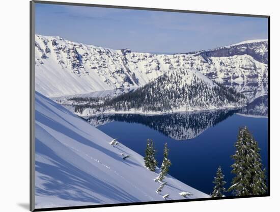 USA, Oregon, Crater Lake National Park. Winter snow on west rim of Crater Lake and Wizard Island.-John Barger-Mounted Photographic Print