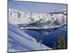 USA, Oregon, Crater Lake National Park. Winter snow on west rim of Crater Lake and Wizard Island.-John Barger-Mounted Photographic Print