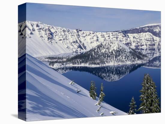 USA, Oregon, Crater Lake National Park. Winter snow on west rim of Crater Lake and Wizard Island.-John Barger-Stretched Canvas