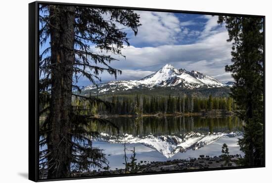 USA, Oregon, Deschutes National Forest. Broken Top framed by conifers and reflected by Sparks Lake.-Mark Williford-Framed Stretched Canvas