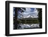 USA, Oregon, Deschutes National Forest. Broken Top framed by conifers and reflected by Sparks Lake.-Mark Williford-Framed Photographic Print