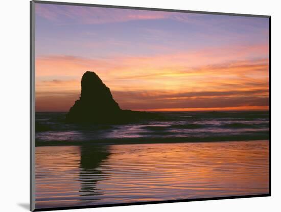 USA, Oregon. Ecola State Park, sunset over sea stack at Indian Beach.-John Barger-Mounted Photographic Print