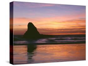 USA, Oregon. Ecola State Park, sunset over sea stack at Indian Beach.-John Barger-Stretched Canvas