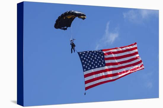 USA, Oregon, Hillsboro, Skydiver with is parachute deployed-Rick A Brown-Stretched Canvas