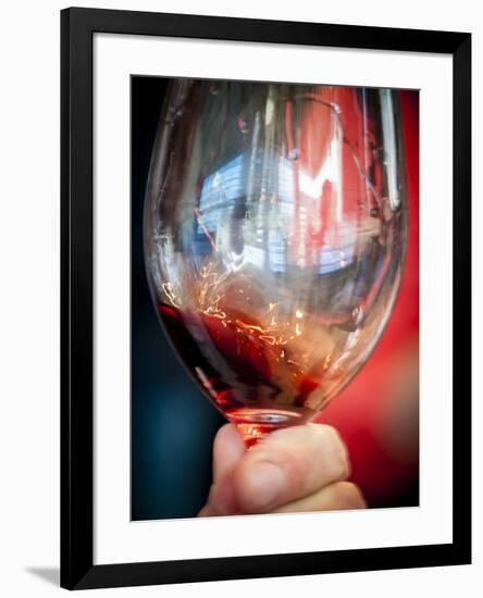 USA, Oregon, Portland. A swirl of red wine in glass reflecting light.-Richard Duval-Framed Photographic Print