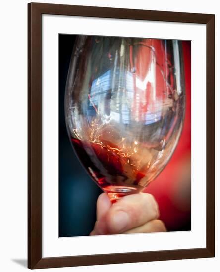 USA, Oregon, Portland. A swirl of red wine in glass reflecting light.-Richard Duval-Framed Photographic Print