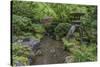 USA, Oregon, Portland, Lantern in a garden.-Rob Tilley-Stretched Canvas