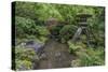 USA, Oregon, Portland, Lantern in a garden.-Rob Tilley-Stretched Canvas