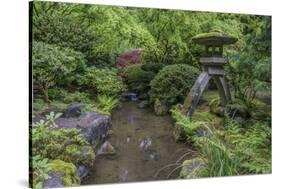 USA, Oregon, Portland, Lantern in a garden.-Rob Tilley-Stretched Canvas