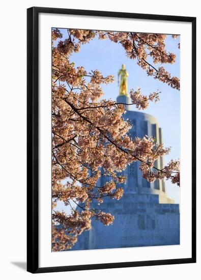 USA, Oregon, Salem, Capitol State Park, statue framed by Blossoms.-Rick A. Brown-Framed Photographic Print