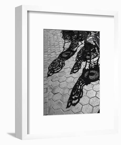 USA, Pennsylvania. Wrought iron chairs and shadows on a patio on a sunny day.-Julie Eggers-Framed Photographic Print
