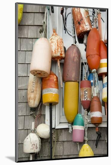 USA, Rhode Island, Block Island. Fishing buoys and floats on a wall.-Cindy Miller Hopkins-Mounted Photographic Print