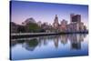 USA, Rhode Island, Providence, city skyline from the Providence River at dawn-Walter Bibikow-Stretched Canvas