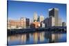 USA, Rhode Island, Providence, city skyline from the Providence River at dawn-Walter Bibikow-Stretched Canvas
