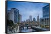 USA, Rhode Island, Providence, city skyline from Waterplace Park at dusk-Walter Bibikow-Framed Stretched Canvas