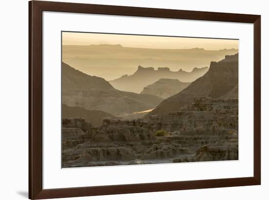 USA, South Dakota, Badlands National Park. Sunrise mist over eroded formations.-Jaynes Gallery-Framed Photographic Print