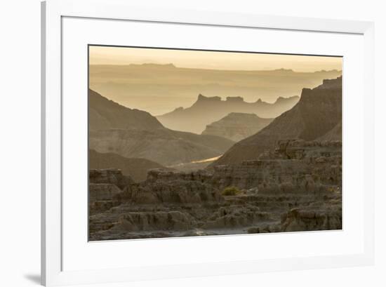 USA, South Dakota, Badlands National Park. Sunrise mist over eroded formations.-Jaynes Gallery-Framed Photographic Print