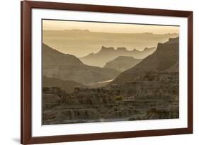 USA, South Dakota, Badlands National Park. Sunrise mist over eroded formations.-Jaynes Gallery-Framed Photographic Print
