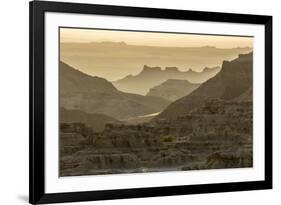 USA, South Dakota, Badlands National Park. Sunrise mist over eroded formations.-Jaynes Gallery-Framed Photographic Print