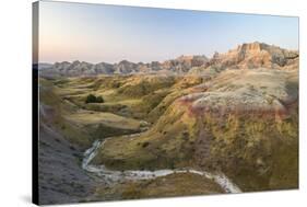 USA, South Dakota, Badlands National Park. Sunrise over eroded formations.-Jaynes Gallery-Stretched Canvas