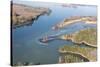 USA, Tennessee. White pelicans curve around islet Tennessee River, Hiwassee Wildlife Refuge-Trish Drury-Stretched Canvas