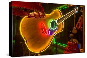 USA, Texas, Austin. Neon Guitar at Blackmail shop.-Randa Bishop-Stretched Canvas