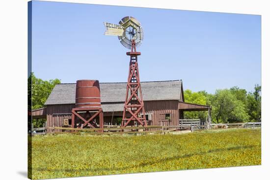 USA, Texas, Austin. Pioneer Farms, Scarborough Barn and windmill-Randa Bishop-Stretched Canvas