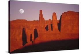 Usa, Utah, Monument Valley, Moon over Rock Formations-Grant Faint-Stretched Canvas