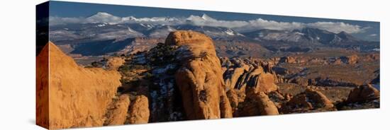 USA, Utah. Sandstone formations in Sand Flats Recreation Area with La Sal Mountain Range, near Moab-Judith Zimmerman-Stretched Canvas