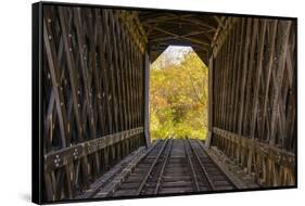 USA, Vermont, Fall foliage seen off Rt. 15, Wolcott, Fisher Covered Railroad Bridge (1908)-Alison Jones-Framed Stretched Canvas